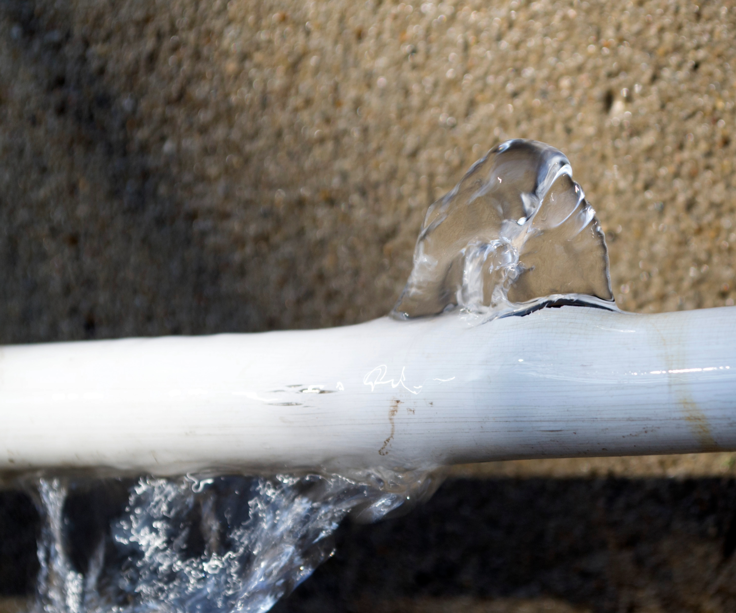 Cracked pipe with ice