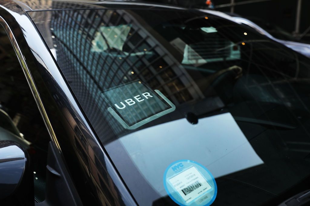 An Uber car waits for a client in Manhattan