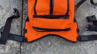 The three belt buckle positions on the Mission Workshop Hauser 10L hydration pack