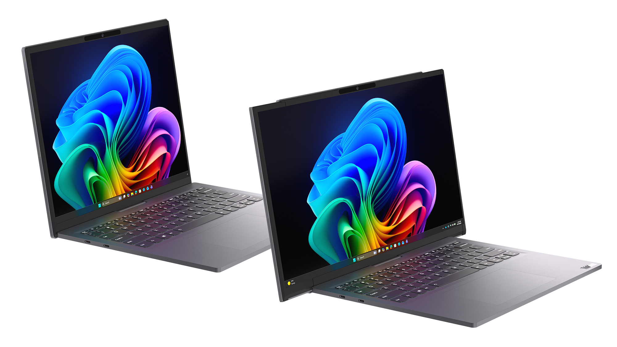 Two Lenovo Project Swan concept laptops side-by-side, demonstrating the screen in standard view versus expanded rollable view.