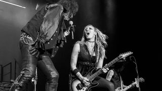 Alice Cooper performs with Nita Strauss on stage at The O2 Arena on October 10, 2019 in London, England. 