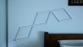 Unlit Nanoleaf Lines design on a wall