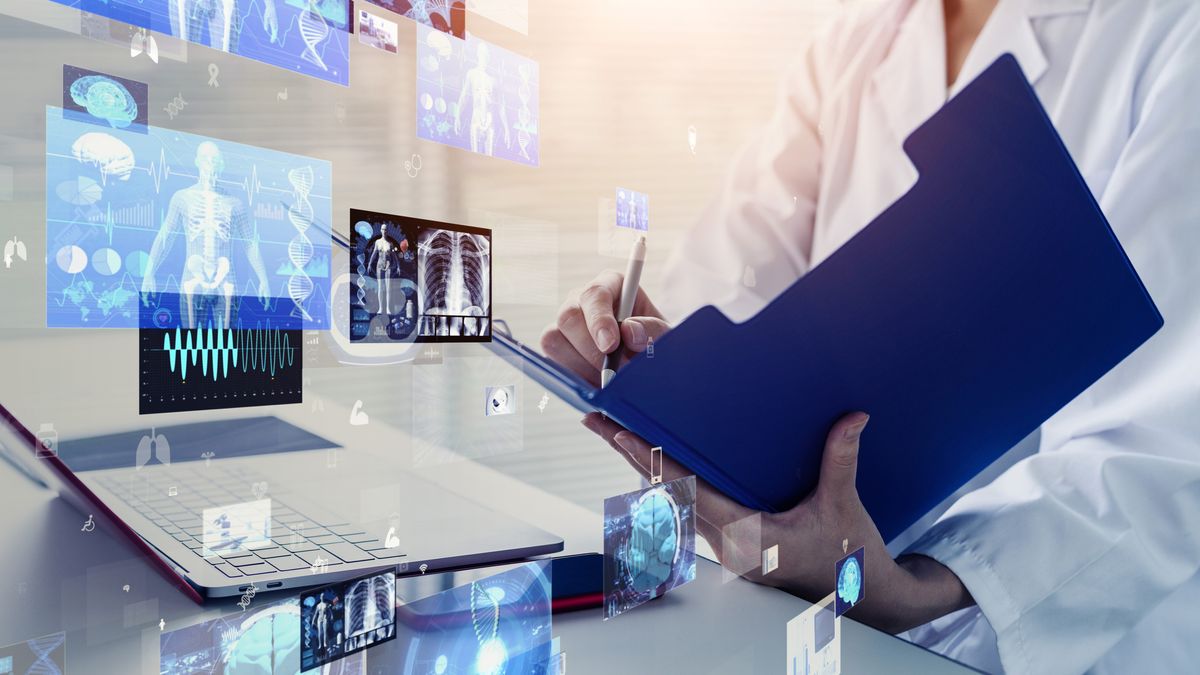 A medical professional in a white coat holding a blue clipboard while healthcare-related images, including a full torso skeleton and an icon of some lungs, spring from an open laptop.