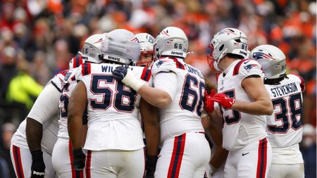 DENVER, COLORADO - JANUARY 25: Drake Maye #10 of the New England Patriots leads the huddle during the second quarter in the AFC Championship Playoff game against the Denver Broncos at Empower Field At Mile High on January 25, 2026 in Denver, Colorado. (Photo by Justin Edmonds/Getty Images)