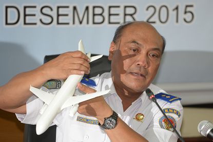 The head of the Indonesian National Transportation Safety Committee (KNKT) speaks at a press conference on AirAsia flight QZ8501.