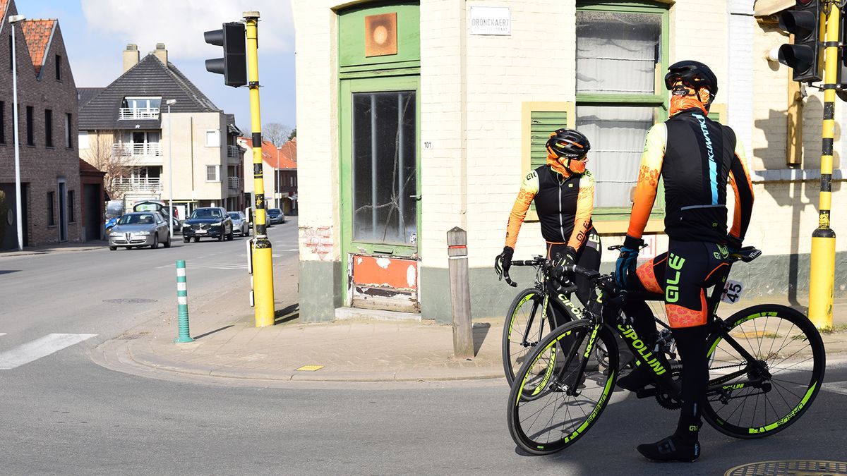 Two Ale Cipollini riders stop to check who's just ridden past
