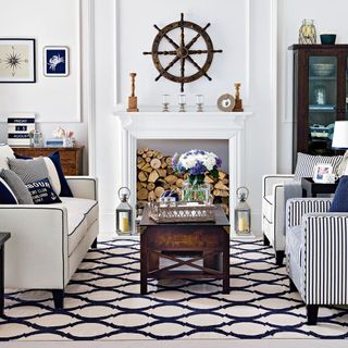 nautical living room with a Hampton's theme and ship's wheel
