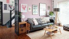 living room with pink wall and side table 