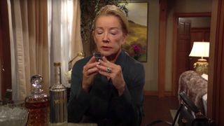 Melody Thomas Scott as Nikki drinking in The Young and the Restless