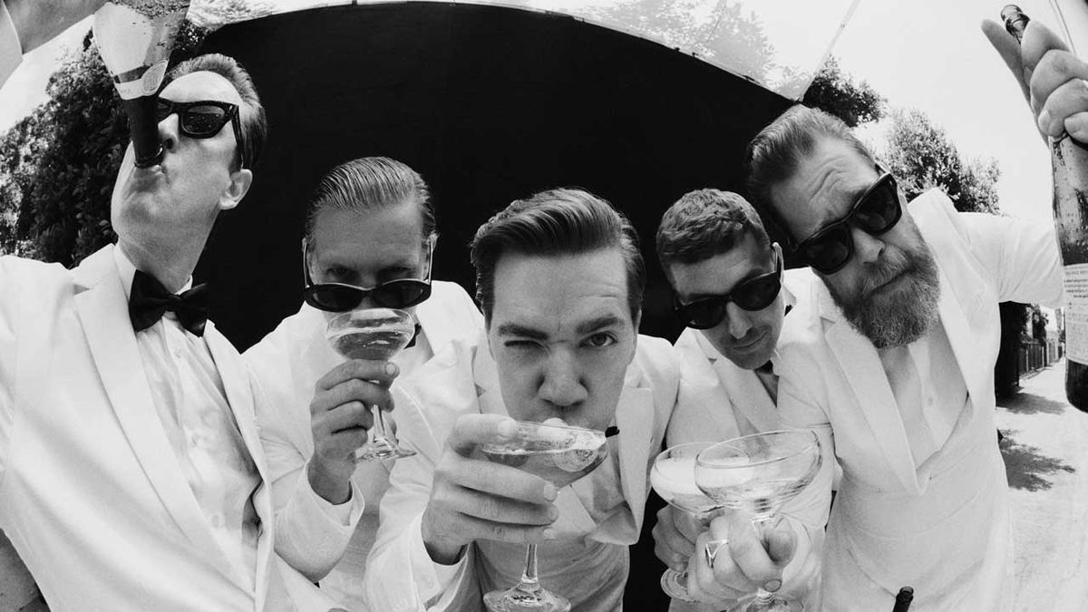 The Hives drinking champagne