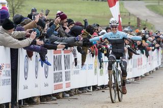 Katie Compton celebrates her 12th consecutive US cyclo-cross title Sunday in Asheville.