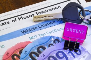 Certificate of motor insurance and road tax payment slips