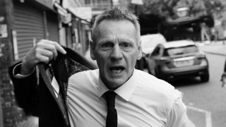 Stuart Pearce in a still from the Stranglers This Song video