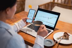 A woman watching stock quotes