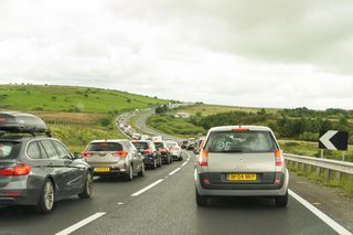 Cars stuck in a traffic jam on a road in the UK