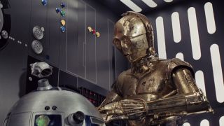 C-3PO and R2-D2 stopping the trash compactor in A New Hope