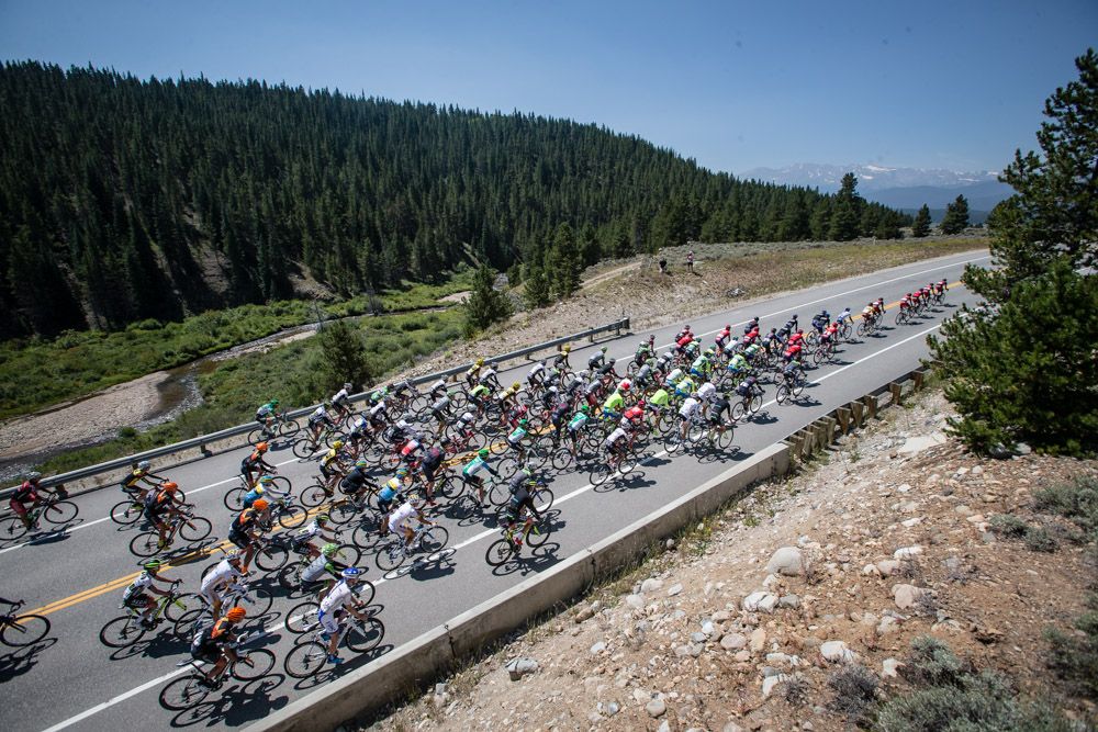 The peloton heads towards more of todays climbing