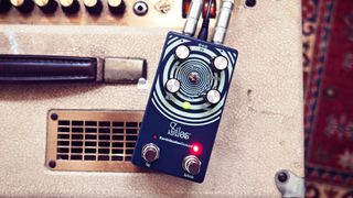 EarthQuaker Devices Silos delay pedal on a guitar amp