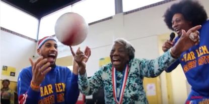 Virginia McLaurin with the Harlem Globetrotters.