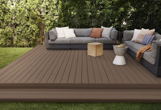 a chocolate brown outdoor wooden deck