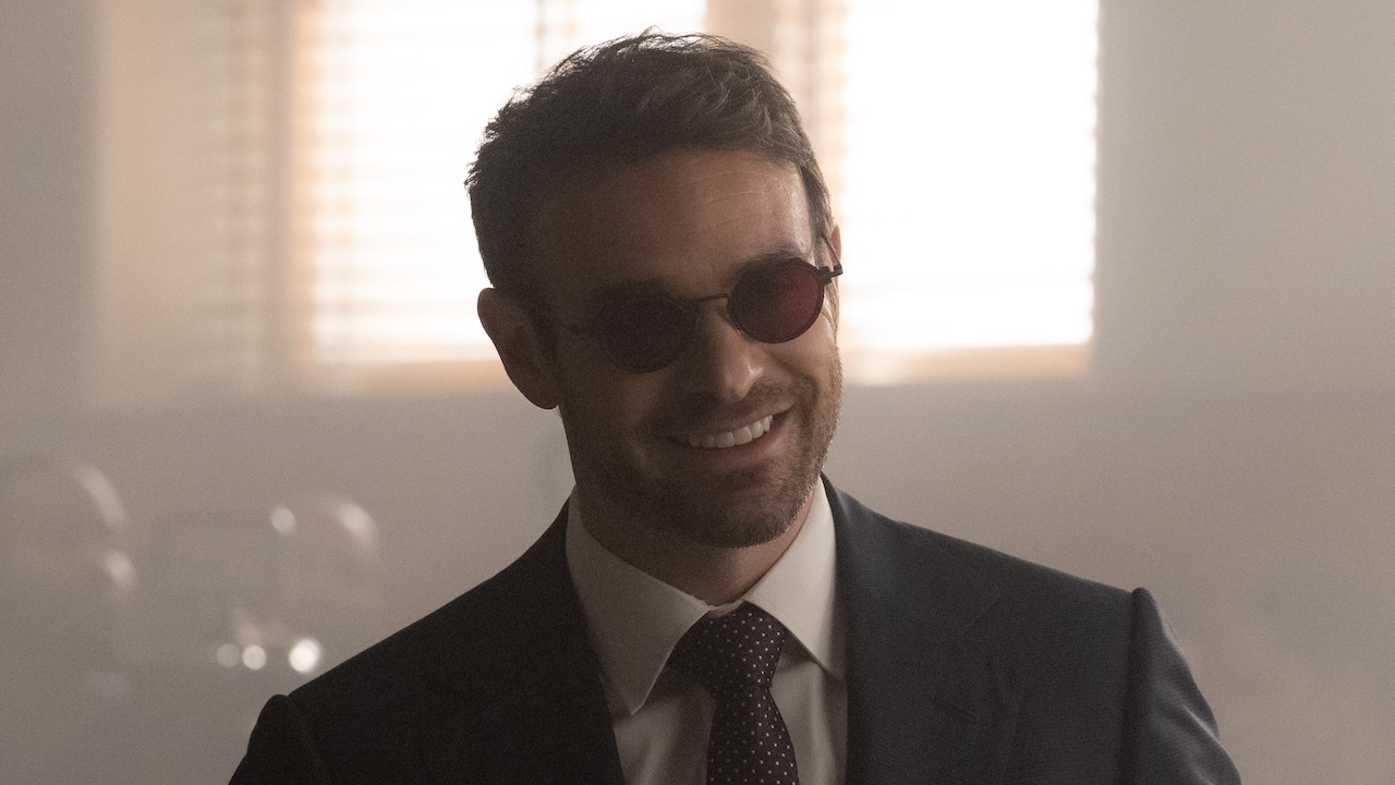 Matt Murdock smiling while standing in courtroom for Karen's hearing in Daredevil: Born Again Season 2