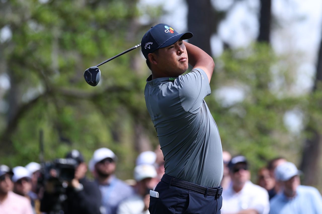 Si Woo Kim plays his shot from the sixth tee during the second round of The Players Championship
