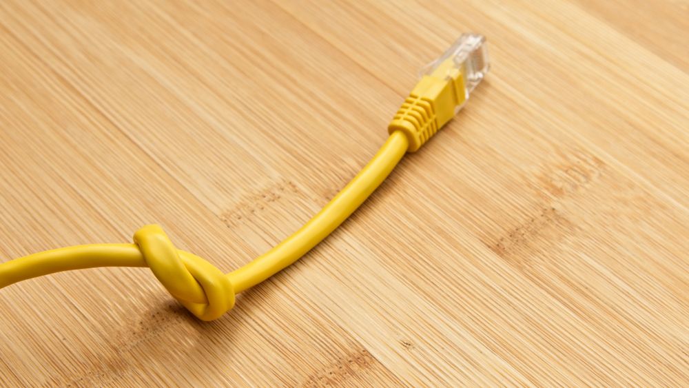 A knotted ethernet cable representing the net neutrality debate