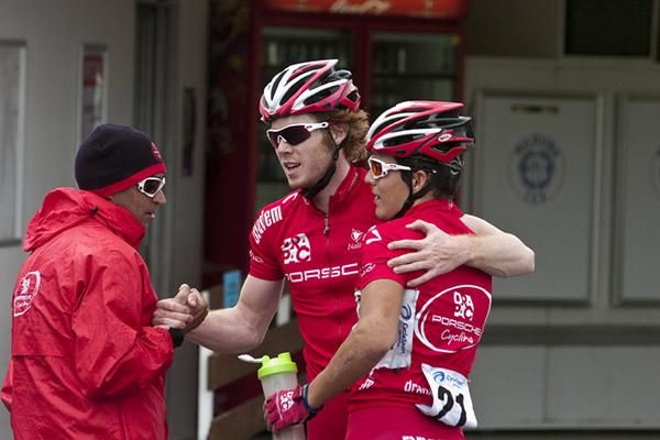 Stage winner Thomas Palmer is congratulated by his Drapac Porsche team manager Agostino Giramondo and teammate Michael Phelan in Merbein.