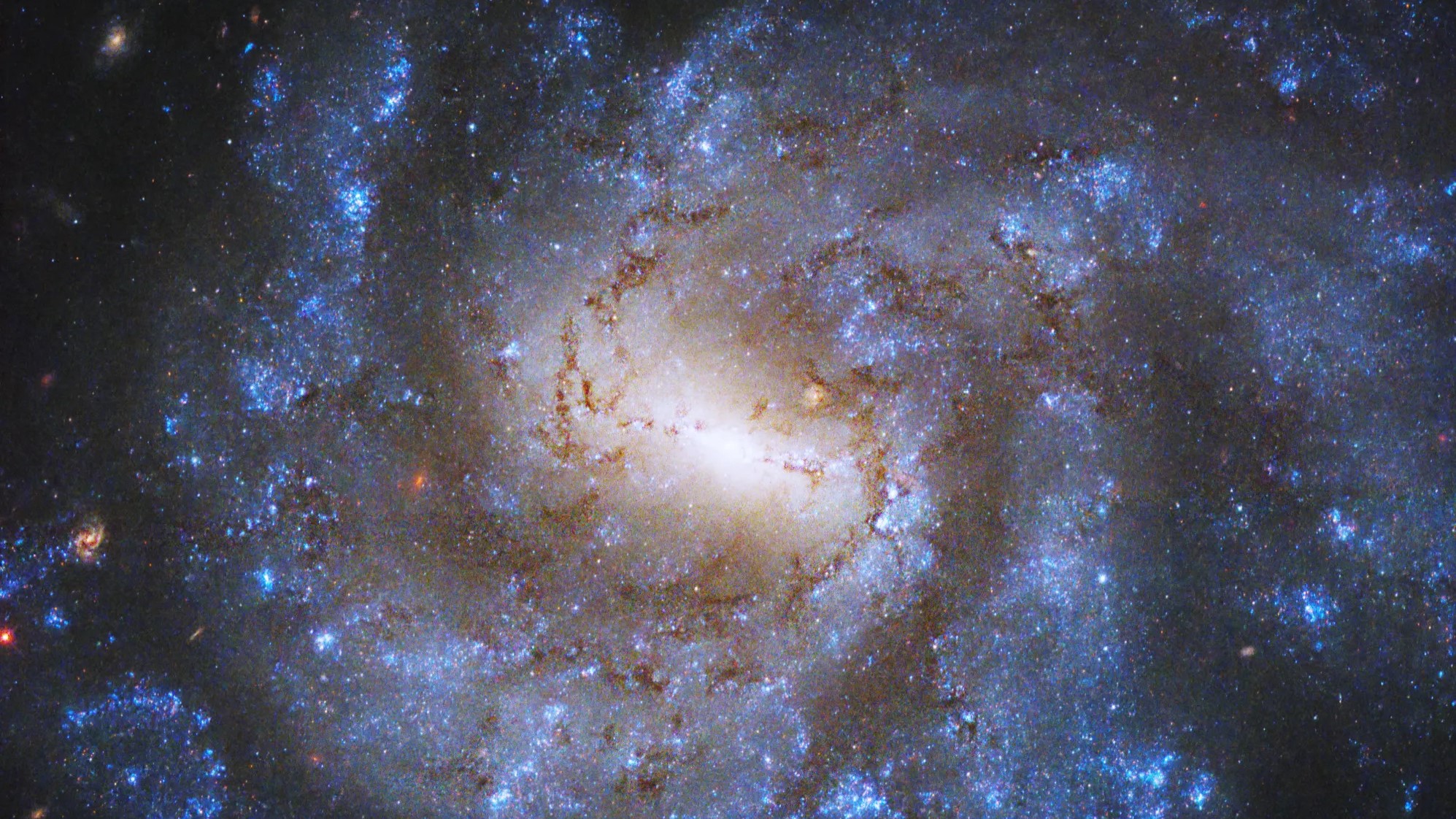 Hubble Telescope captures star-packed galaxy spinning like a top (photo) Space