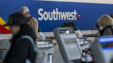 Southwest fliers check in at Oakland International Airport