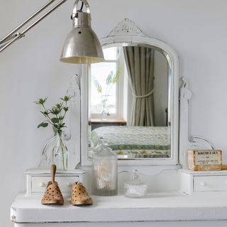 white bedroom with dressing table