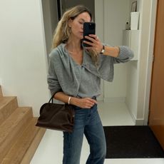 Anouk Yve in a grey Tove sweater