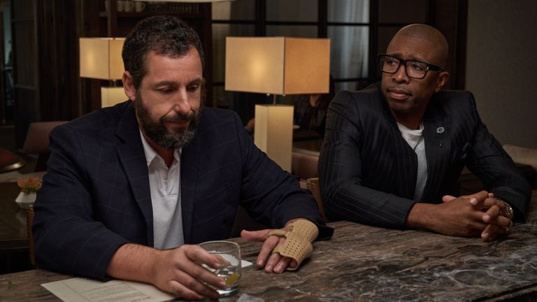 Adam Sandler as Stanley Sugerman and Kenny Smith as Leon Rich in Hustle