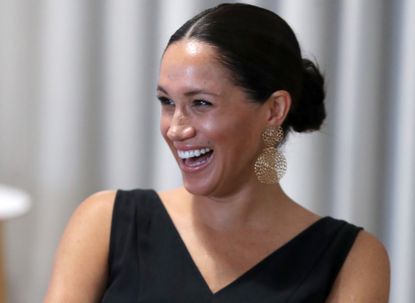 Meghan, Duchess of Sussex laughs with 12 inspiring female entrepreneurs as she visits Woodstock Exchange