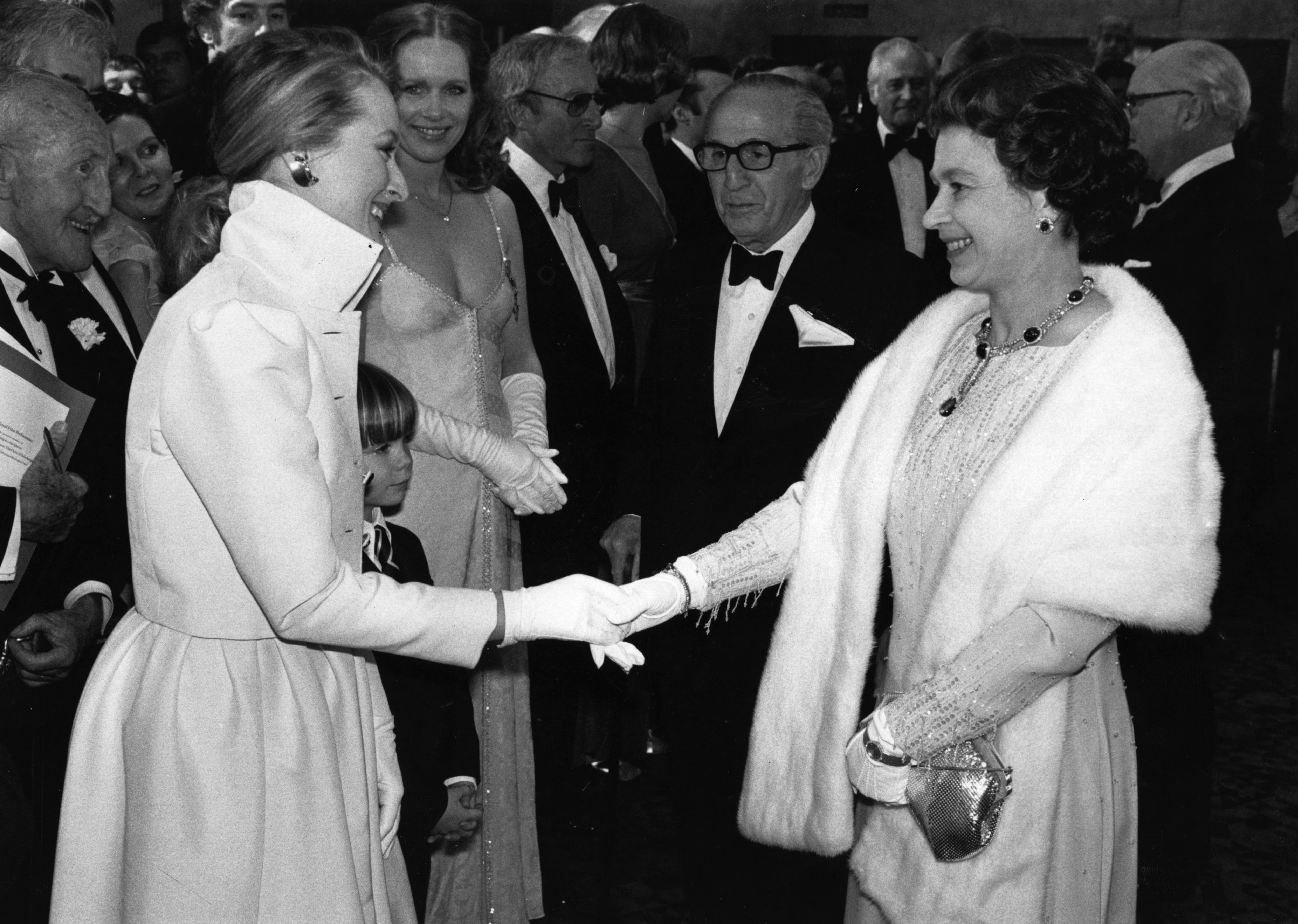 American actress, Meryl Streep meeting Queen Elizabeth II after a Royal Film Performance of 'Kramer vs Kramer' at the Odeon, Leicester Square, London.