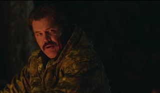 The Legacy of a Whitetail Deer Hunter Josh Brolin angry at a campfire