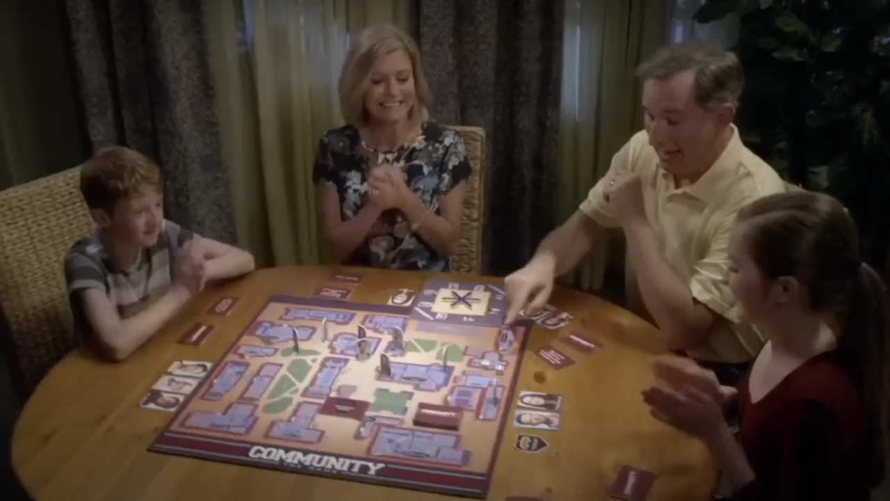 Family playing Community: The Board Game