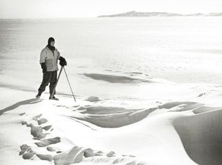 Happier times: British explorer Robert Falcon Scott stands alone in Antarctica's glittering white wilderness. The photo was included in a remarkable book, "The Lost Photographs of Captain Scott" (Little, Brown and Co., 2011), written by David M. Wilson, the great-nephew of Scott's confidante Edward Wilson.