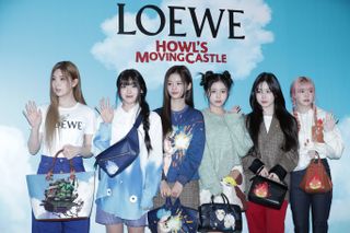 SEOUL, SOUTH KOREA - FEBRUARY 02: (L-R) Bae, Jiwoo, Sullyoon, Kyujin, Haewon and Lily aka Lily JIn Morrow of girl group NMIXX are seen at the unveiling of the LOEWE X Howl's Moving Castle of Studio Ghibli collaboration at the hyundai on February 02, 2023 in Seoul, South Korea. (Photo by Han Myung-Gu/WireImage)