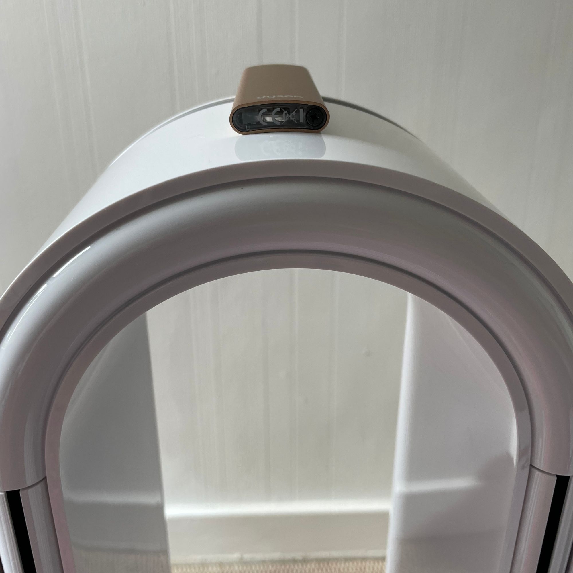 Zoomed in on the top of the Dyson Purifier Humidify+Cool PH2 De-Nox, where the remote is resting on it