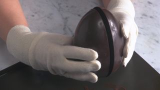 sticking a chocolate egg together
