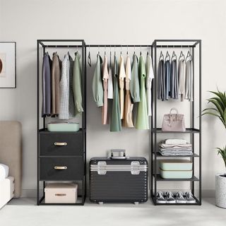 An open closet with various clothes and accessories