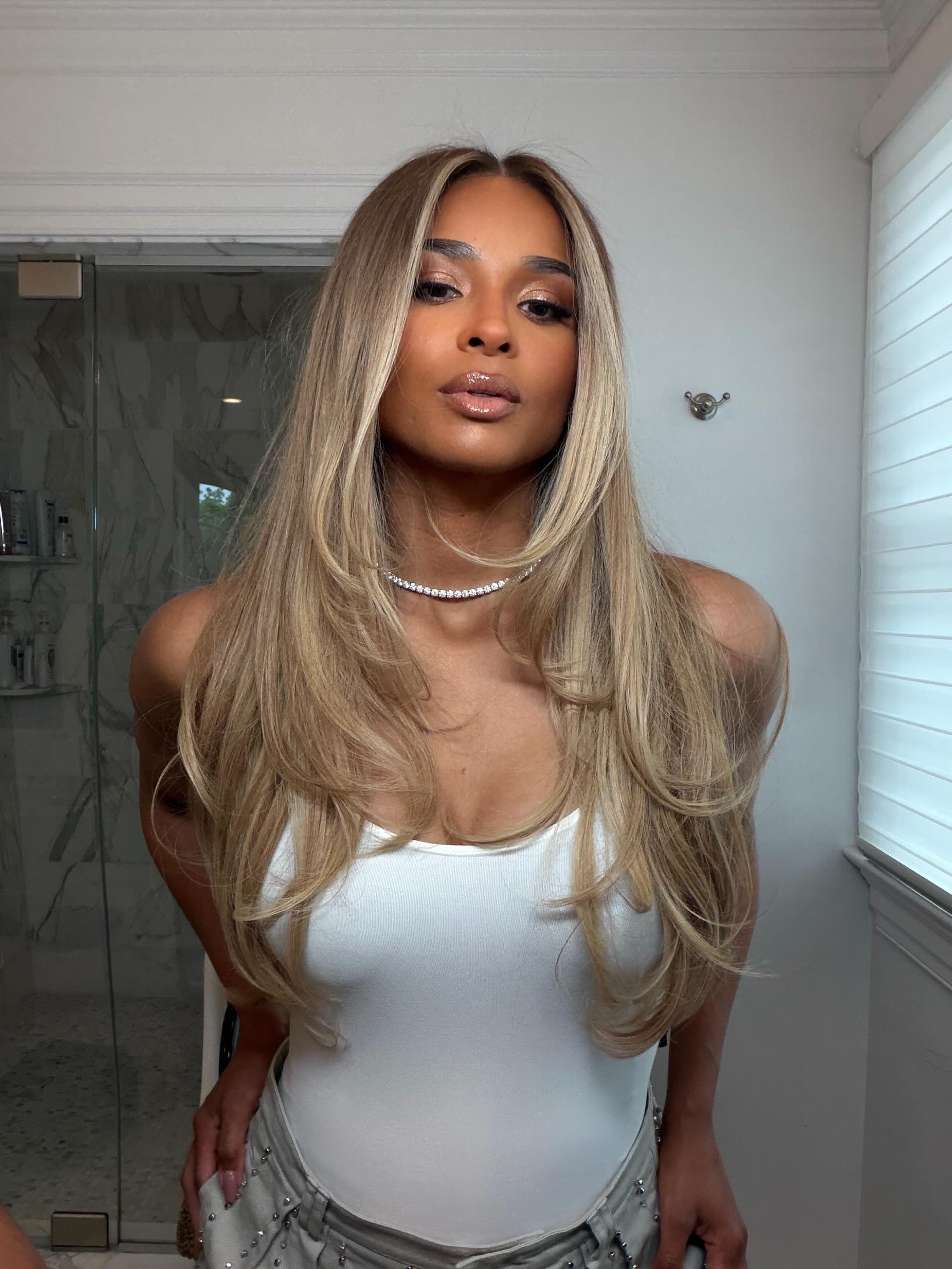 Image of Ciara with milk tea blonde hair.