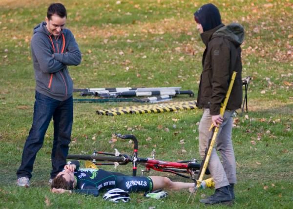 A post-race cleanup crew wonders what to do with an exhausted racer.