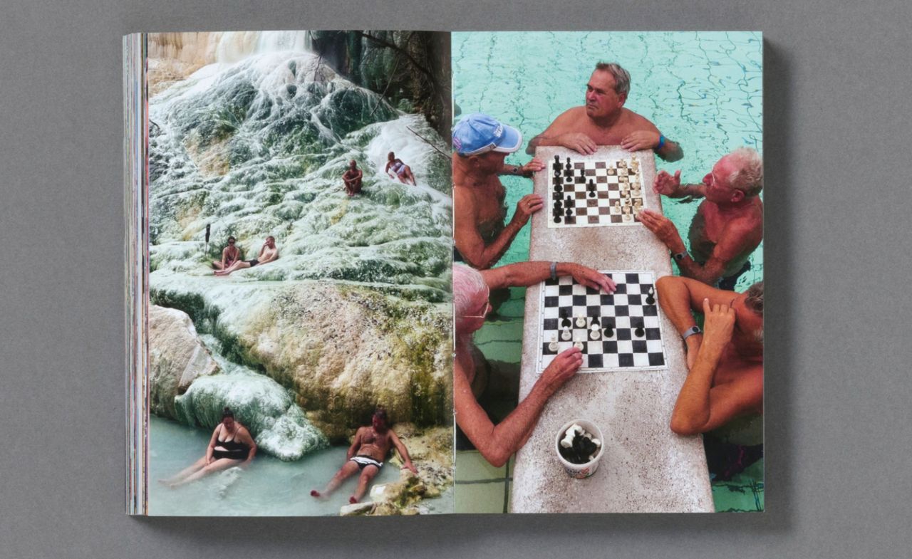 Tourists playing chess in swimming pool