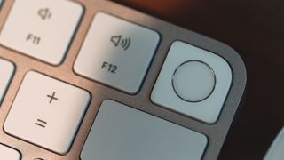 lose up of Touch ID element on new Apple Magic keyboard introduced in 2021 alongside new iMac.