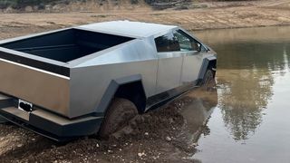 A Tesla Cybertruck stuck in water