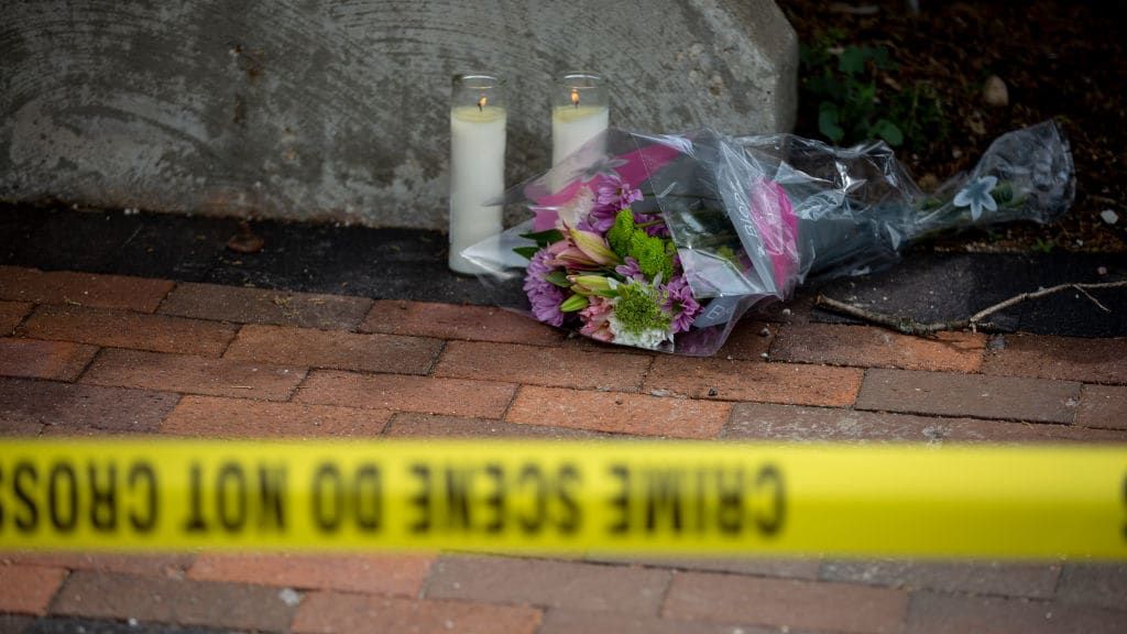 Flowers at the scene of the Highland Park shooting.