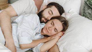 Couple sleeping in a spooning position