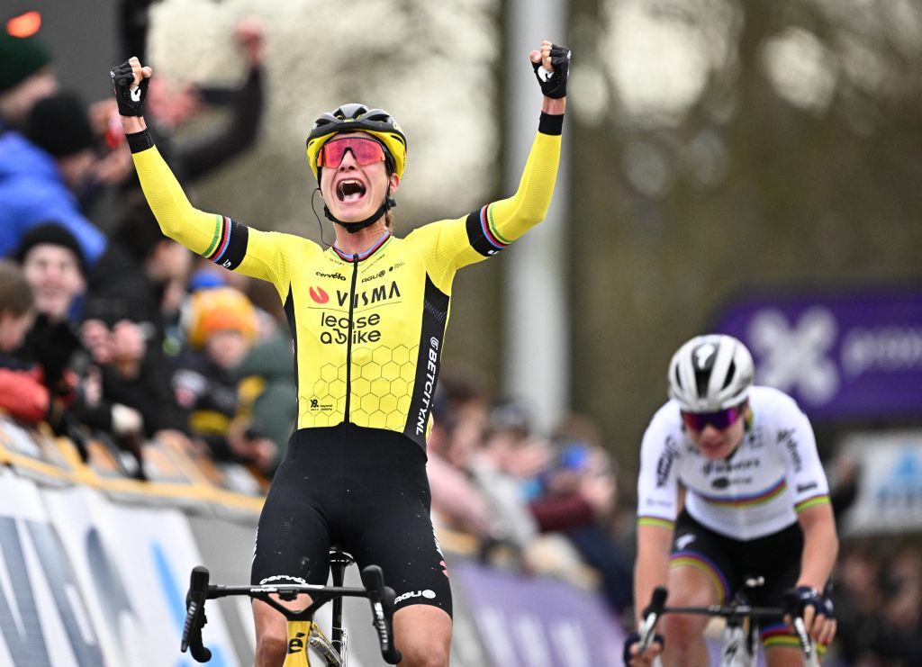 Dutch Marianne Vos of Team Visma-Lease a Bike celebrates after winning the sprint ahead of Belgian Lotte Kopecky of SD Worx - Protime in the women's one-day cycling race Omloop Het Nieuwsblad (UCI World Tour), 127,1km from Gent to Ninove on February 24, 2024. (Photo by JASPER JACOBS / Belga / AFP) / Belgium OUT